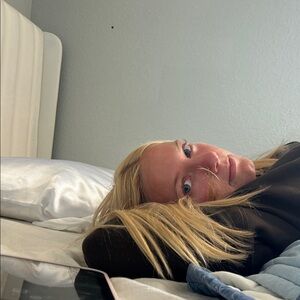 Black Long Sleeve Top with Blonde Hair Accent